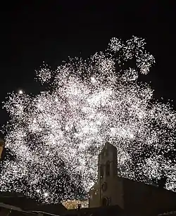 Fireworks outside the church of St. John the Baptist