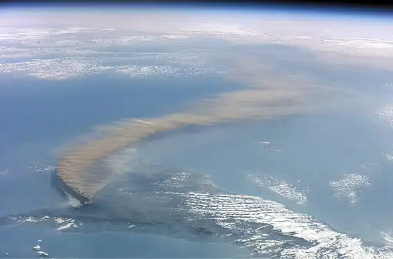 A 2002 eruption of Mount Etna, a volcano on the Italian island of Sicily, viewed from the International Space Station. (Credit: NASA, with image edits by User:Darkone.)