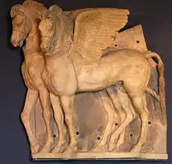 The winged horses relief which decorated the pediment of the Ara della Regina temple.