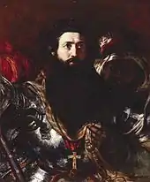 Bearded man in armour, accompanied by a black servant