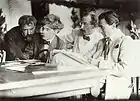 Eugene, Stieglitz, Kühn and Steichen Admiring the Work of Eugene, by Frank Eugene from 1907. From left to right are Eugene, Alfred Stieglitz, Heinrich Kühn, and Steichen.
