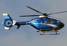 Blue-and-gray police helicopter