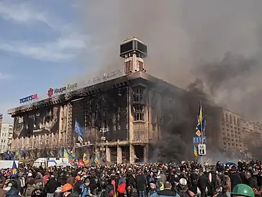 Image 12Burning of the Trade Unions BuildingPhotograph: AmakuhaThe burning of the Trade Unions Building—used as the headquarters of the Euromaidan movement—during the 2014 Ukrainian revolution, following a failed attempt by the Ukrainian police to capture the building. After the fire, the damaged building was covered with large canvas screens on two sides with the words "Glory to Ukraine" printed on them in large letters.More selected pictures