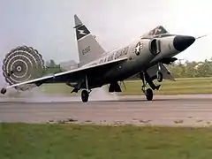 F-102 deploys braking parachute