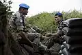 NKB commander, Brigadier General C B Ponnappa and FC Gen. Santos Cruz in the trenches of Munigi hill, 22 August 2013