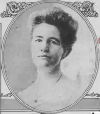 A black and white head-shot photograph of a woman