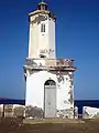 The front door of the lighthouse with the lantern on top