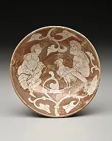 Fatimid Luster Plate with Cock Fight. Cairo, 11th-12th century