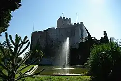 Fountain and castle Duino