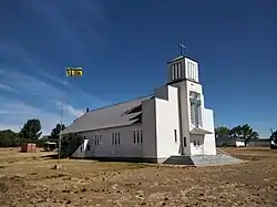 Fransaskois flag flying outside church