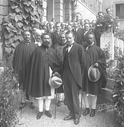 Group of men standing on staircase