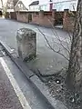 London Road milestone opposite Figges Marsh, looking south west