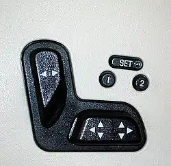 Car seat controls in the shape of actual car seat