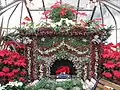 Fireplace topiary made of hypoestes, ivy, echevaria and dusty miller