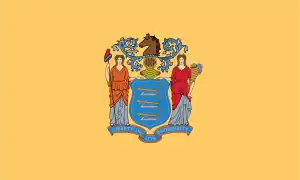 The flag shows the state's coat of arms in a yellow background