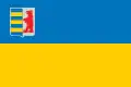 The flag of the Zakarpattia Oblast is a Ukrainian flag defaced with the coat of arms.