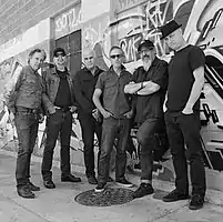 2018; L-R: John Doe, Dave Alvin, Chris D, Bill Bateman, Steve Berlin, DJ Bonebrake.