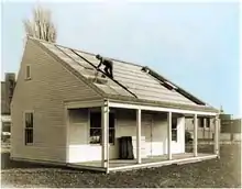 Image 17MIT's Solar House #1, built in 1939 in the US, used seasonal thermal energy storage for year-round heating. (from Solar energy)