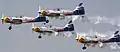 Zlín Z-50s of The Flying Bulls aerobatics team at Aero India 2013