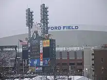 Ford Field on Super Bowl XL Sunday, countdown to kickoff on Comerica Park's scoreboard.