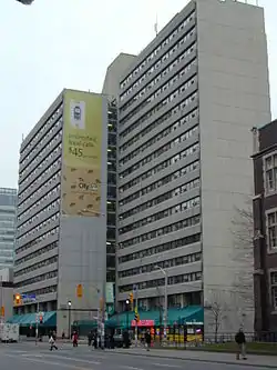 Eighteen-storey skyscraper constructed with a concrete exterior and rows of glass windows