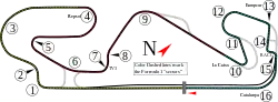 A track map of the Circuit de Barcelona–Catalunya. The track has 16 corners, which range in sharpness from hairpins to gentle, sweeping turns. There are two long straights that link the corners together. The pit lane splits off from the track on the inside of Turn 16, and rejoins the track after the start–finish straight.