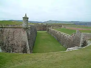 Bartizan turrets guard the scarp (dry moat) for defence in depth