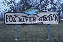 Village sign in Lions Park