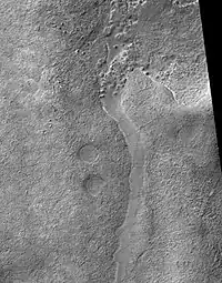 Frento Vallis in Noachis quadrangle, as seen by HiRISE.  Click on image to see better view of Dust Devil Tracks.  In the Arcadia quadrangle on Mars, its exact location is centered at 37 degrees north latitude and 93.1 degrees west longitude.  It is 357 km long and was named after a classical river.