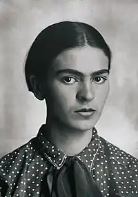 A black-and-white portrait of a woman