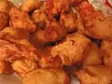 Deep-fried chicken with sweet and sour sauce.