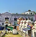 Front Facade of the Mallick Bari Palace, with four of the twelve Shaivite shrines visible