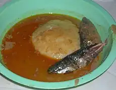 A peanut soup with fufu and fish