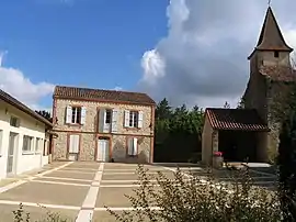 The town hall and church in Fustérouau