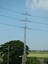 Steel pole 227 (of anchor or flag design) located near San Simon Exit of North Luzon Expressway (NLEX).