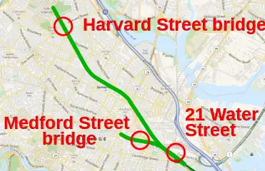 A map of the GLX corridor with the Medford Street bridge, Harvard Street bridge, and 21 Water Street circled