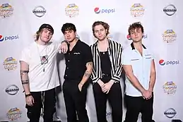 Image 35Typical late 2010s fashion of Australian band 5 Seconds of Summer in 2018 (from 2010s in fashion)