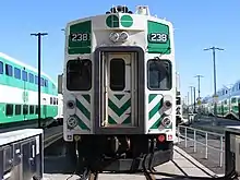 Image 12This cab car includes a horn (top), a bell (top right), headlights (above the door), classification lights (red lights on side), and ditch lights (white lights on side). (from Train)