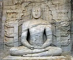 Image 1The seated image of Gal Vihara in Polonnaruwa, 12th century, which depicts the dhyana mudra, shows signs of Mahayana influence. (from Sri Lanka)