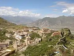 Ganden Monastery in Lhasa with some ruins visible from destruction by the Communist Chinese after 1959 flight of the 14th Dalai Lama to exile in India.