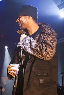 Jackson performing with The Alchemist in 2014