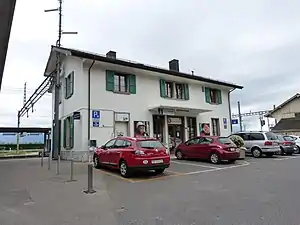 Two-story building with gabled roof