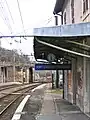 Gare de Fort l'Ecluse Collonges.  The clock works, although it's on summer time in winter.  In the left background, the Divonne line climbs away steeply