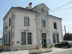 Two-story building with hipped roof