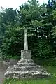 Garsington preaching cross has its medieval base and a remnant of its medieval shaft. Upon it are a small 20th century shaft and top.