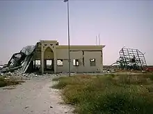 Damaged building, May 2002