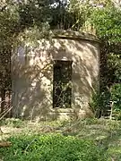 The ruins of one of the two listed gazebos