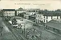 Tram rails in front of the station, on a postcard from 1916