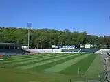 MOSiR Stadium with the main stand on the left.