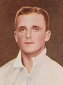 A man wearing a white shirt